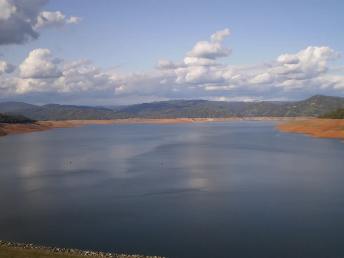 Lake Oroville reservoir ringed by bare Butte County foothills above the waterline